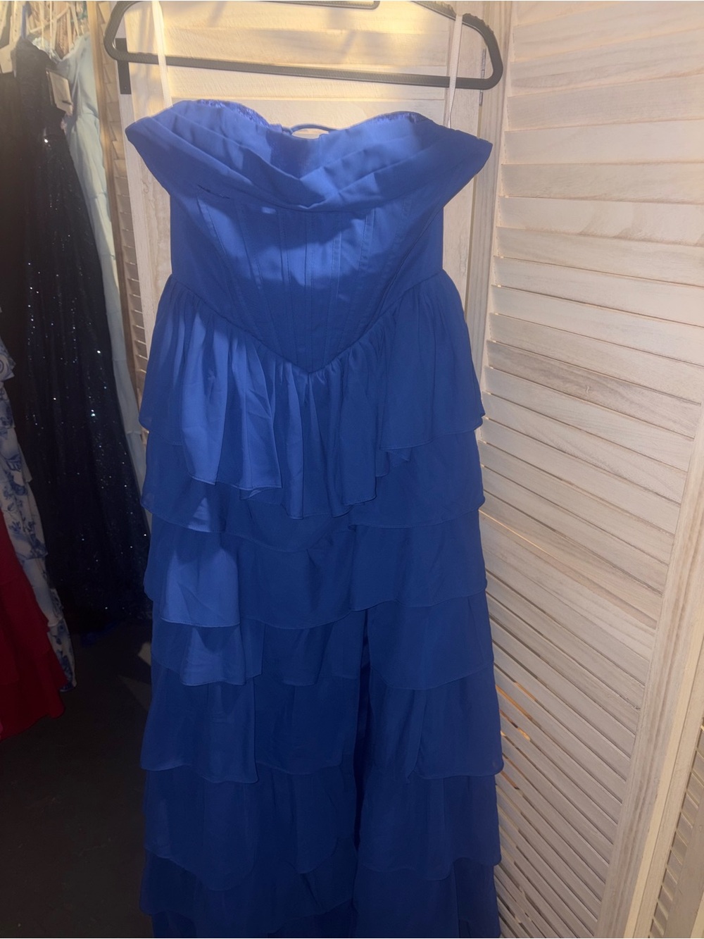 Royal Blue Strapless Ruffled Tiered Gown.